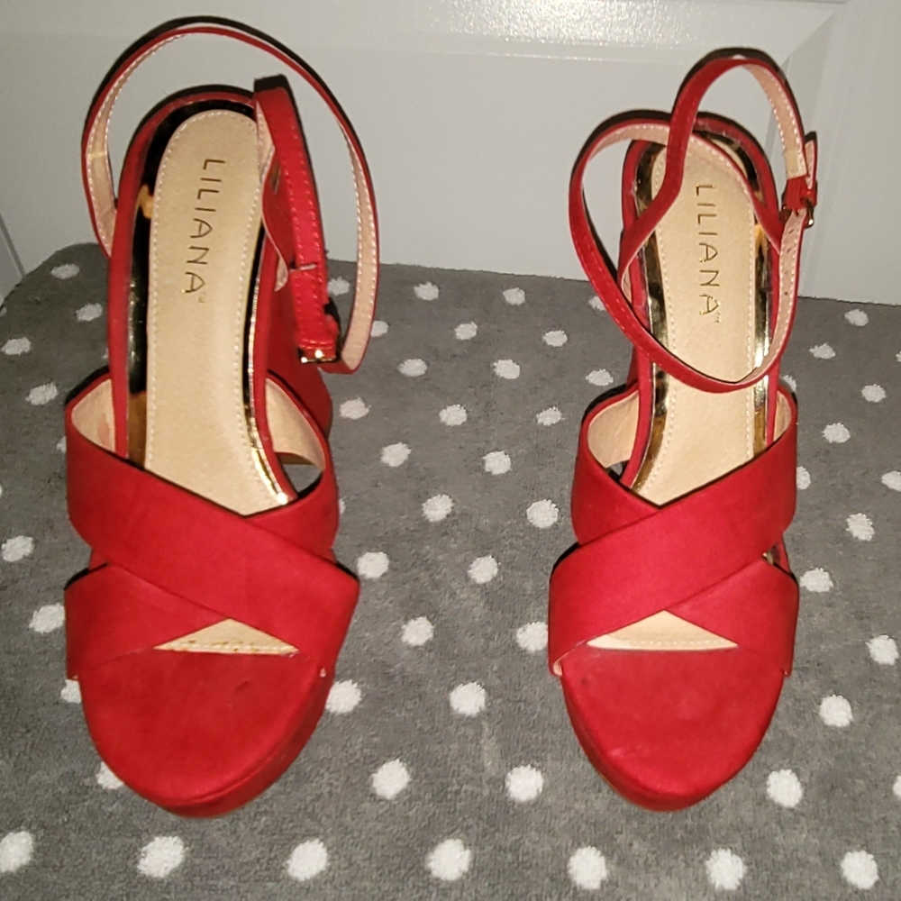 Red platform heels with ankle strap